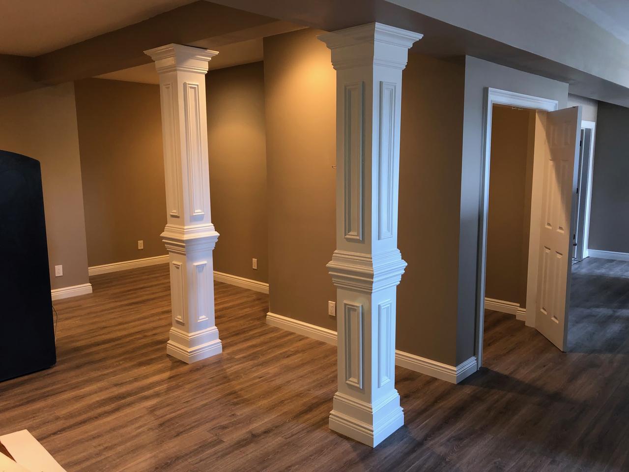 Custom wrapped column with raised panel trim after