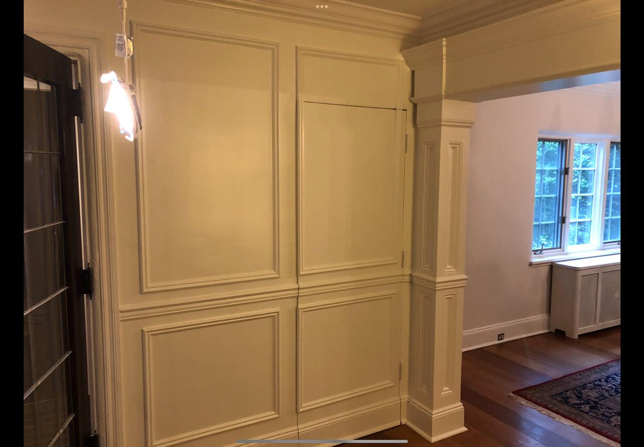 Dark painted archway with millwork detail