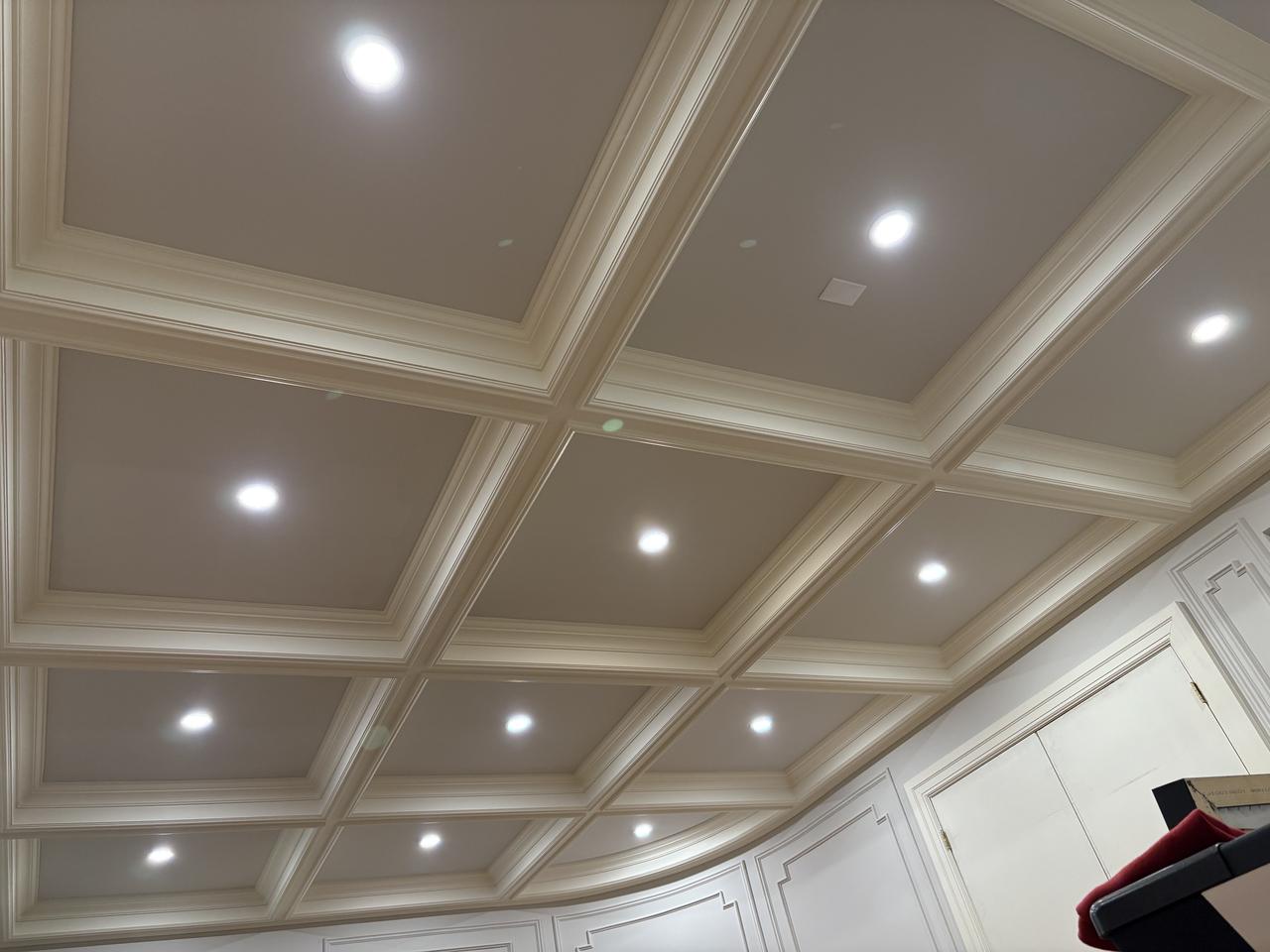 Coffered ceiling following a curved wall