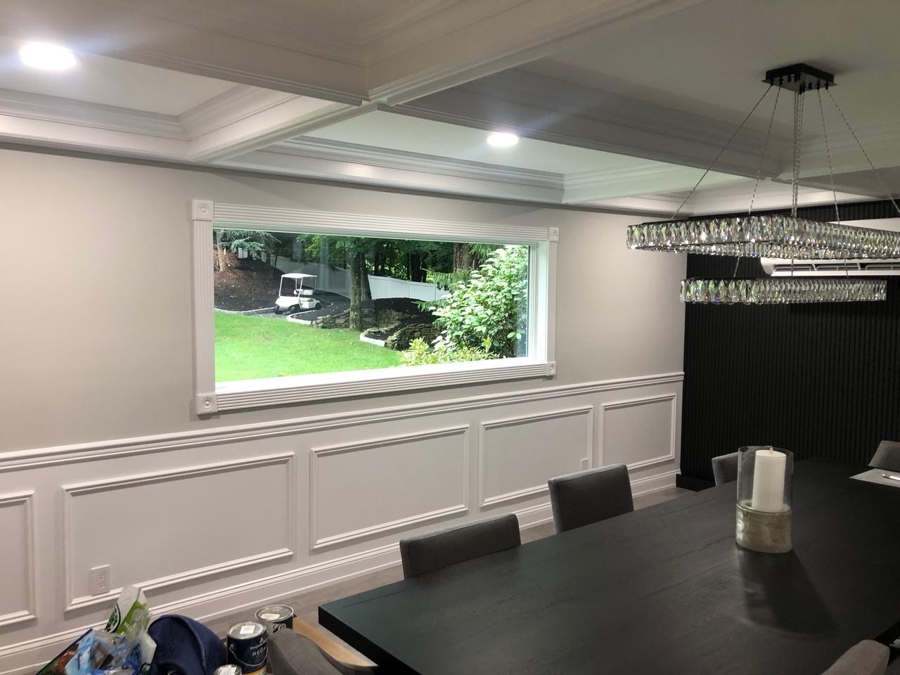 Dining room coffered ceiling over a long table