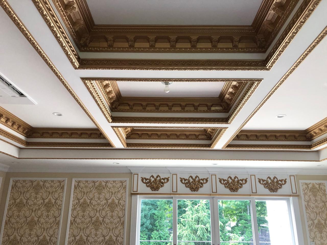 Elaborate gilded coffered ceiling detail