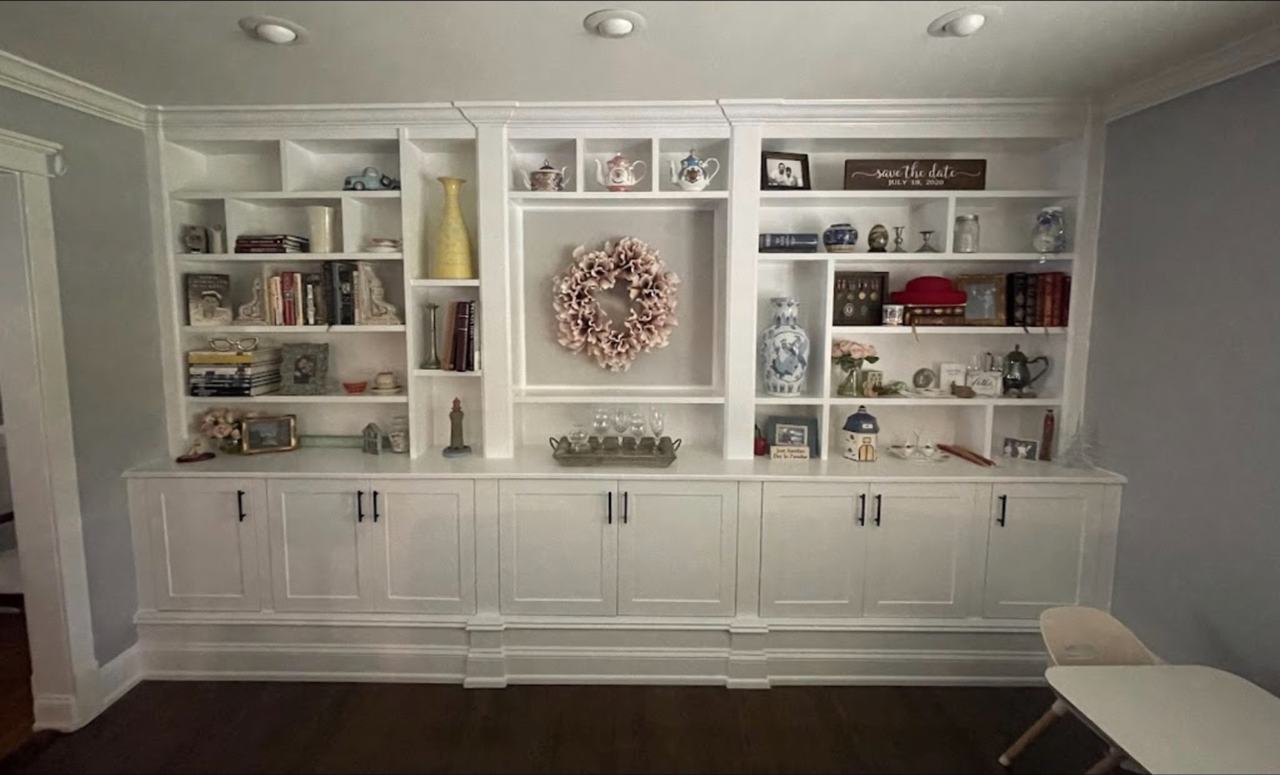 Built-in shelving and fireplace mantle