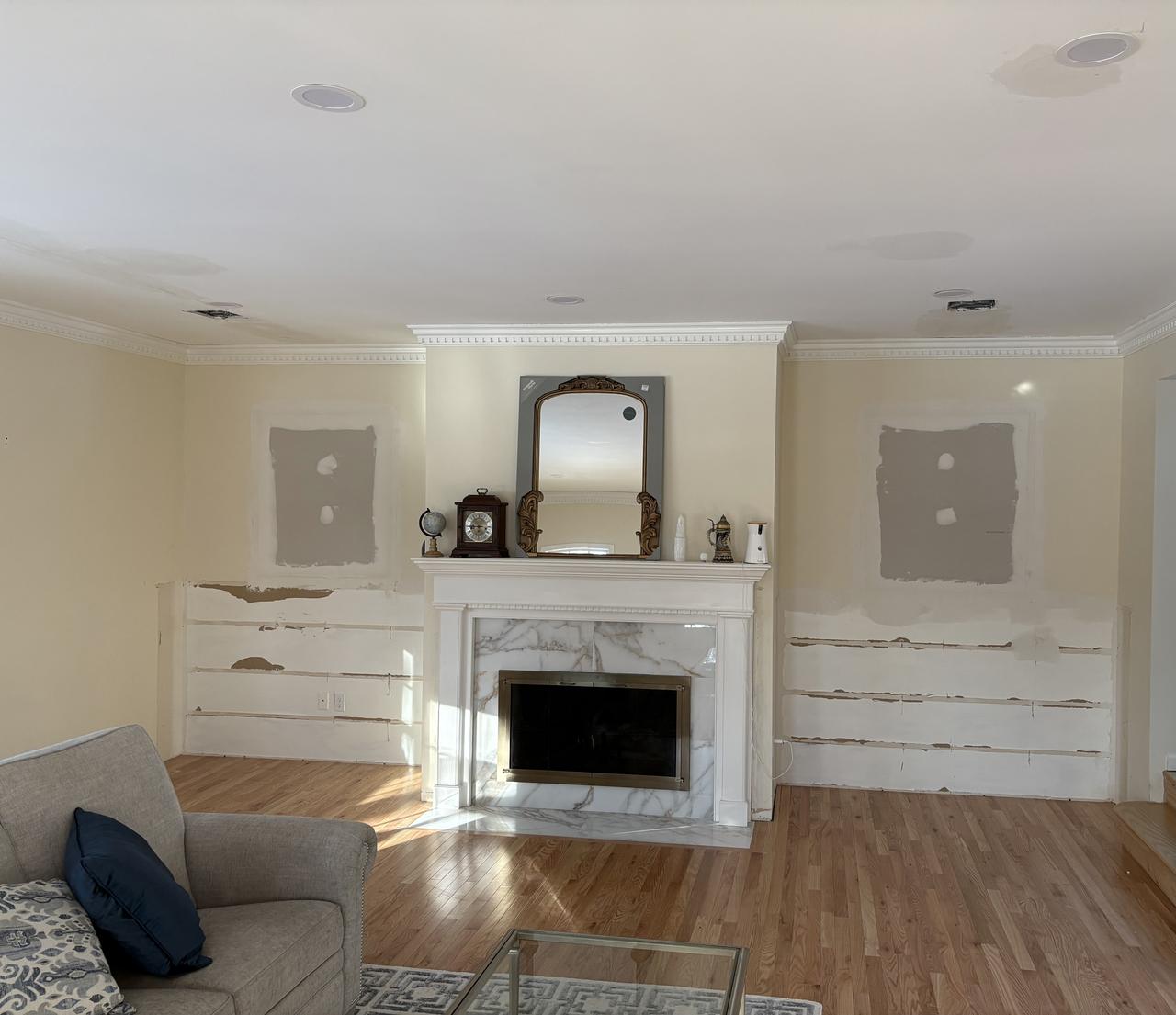 Fireplace mantel with mirror above