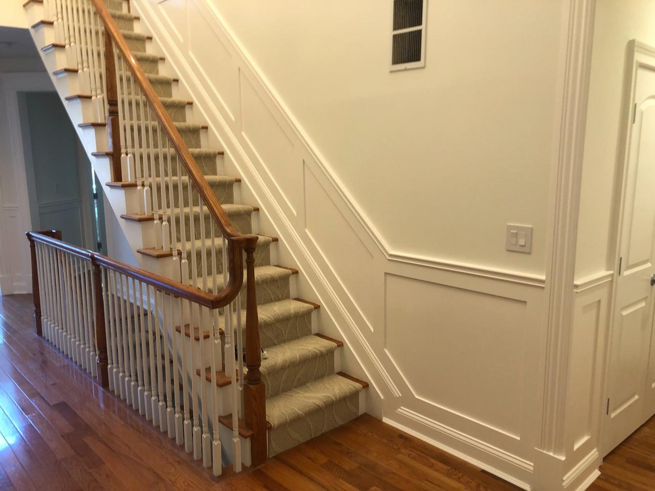 Staircase with painted wainscoting