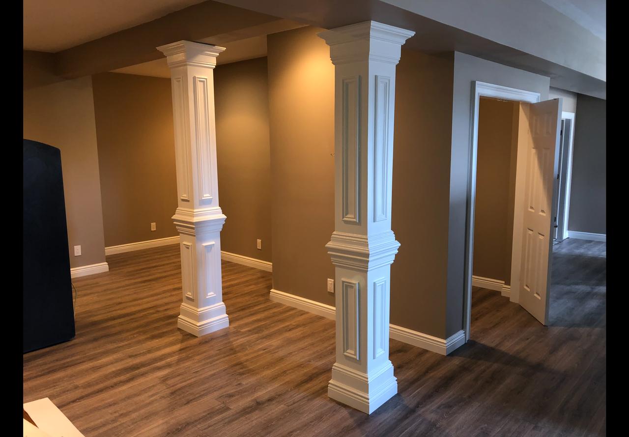 Wainscoting paneling with decorative columns